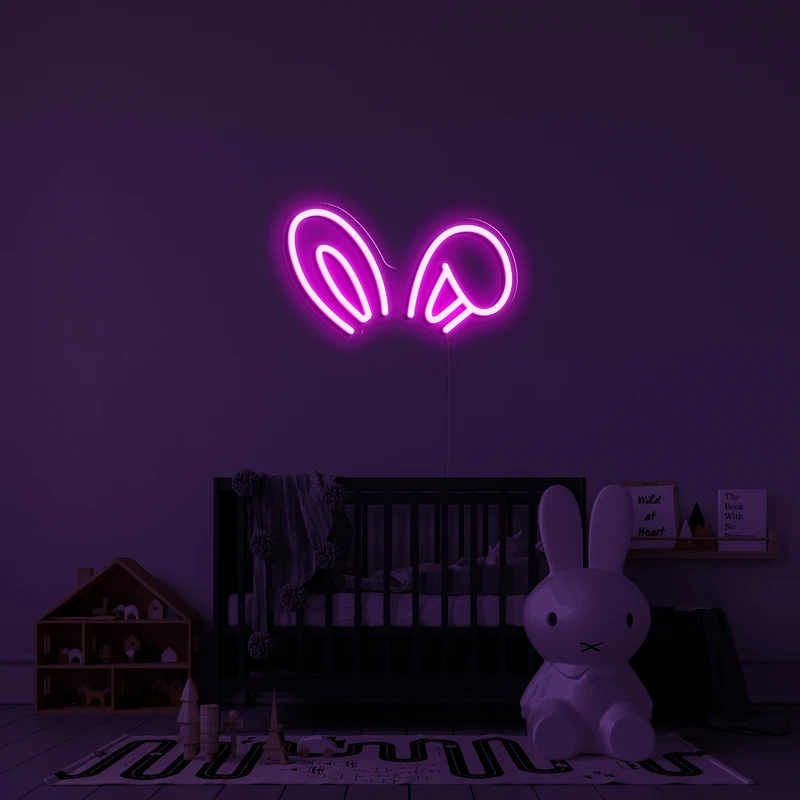 3D-glödande neonlogotyp på en vägg - kaninöron