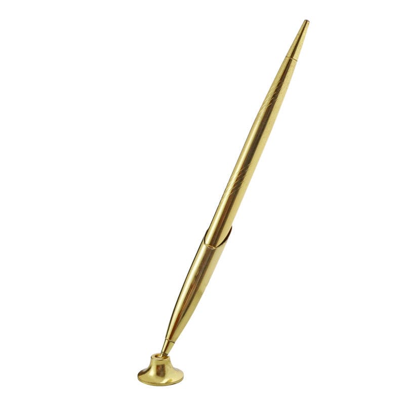 elegant guldpenna med stativ