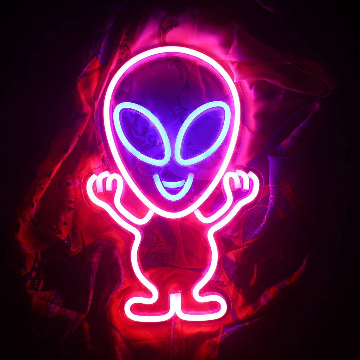 led neon logotyp lyser på väggen - utomjording